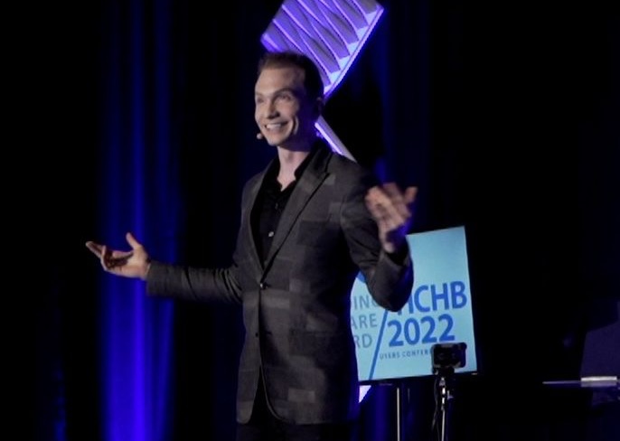 Trigg Watson emceeing a corporate event