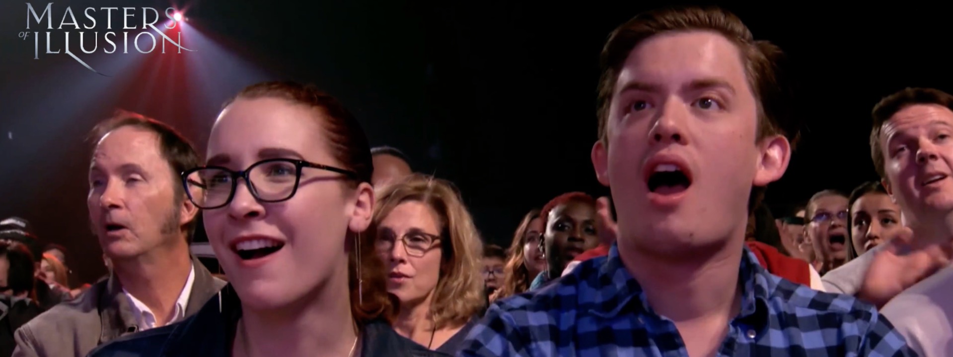 Stunned audience reacting in amazement on Masters of Illusion